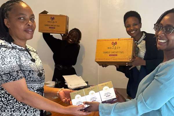 Handing over Neli & Co sanitary towels from the Child.org Team to Narok Sub County Health Management Team